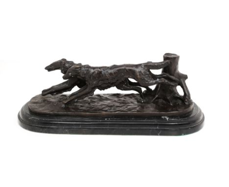 After Antoine-Louis Barye (1796-1875, French); bronze sculpture of two setter dogs, standing on naturalistic base, raised on 