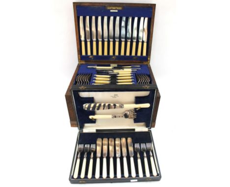 A large Walker &amp; Hall canteen of cutlery in oak box with drawers along with another cased fish cutlery set. (2)
