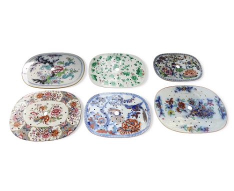 A collection of 19th Century porcelain large meat strainers, all different Staffordshire makers and patterns, Masons, Wedgewo