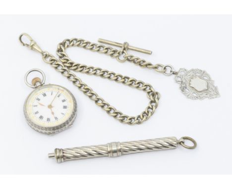 A ladies silver cased open faced pocket, comprising a white enamel dial, numeral markers with gilt border, foliate decoration