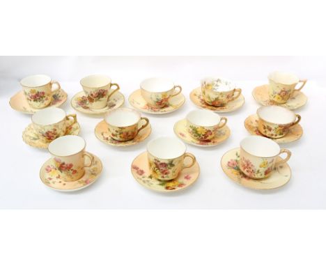 A selection of mixed Royal Worcester blush ivory cups and saucers in varying sizes, with floral decoration, mixed coloured ma