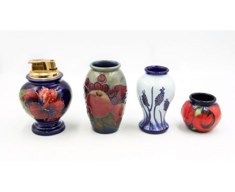 A group of 4 Moorcroft pottery items to include a Finches Blue Vase designed by Sally Tuffin  approximate height 10cm, a vase