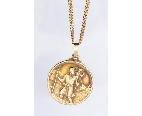 A 9ct gold St Christopher medallion pendant, diameter approx 28mm, suspended from a 9ct gold flat link trace chain, length ap