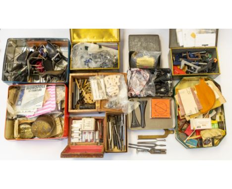  A collection of violin parts, spare repair items to include tuning forks and other musical parts.