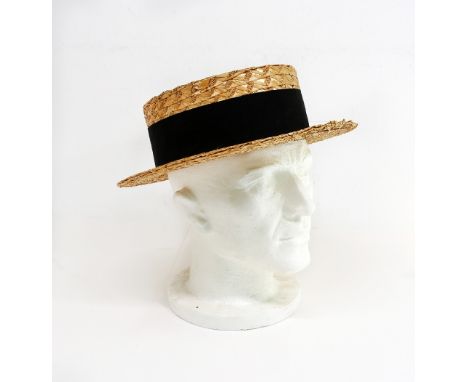 An Olney Headwear straw boater hat.