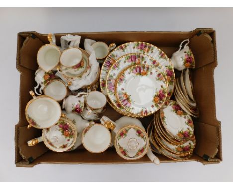 An assortment of Royal Albert Old Country Roses tea and dinnerware to include cups, saucers, teapot and coffee pot, dinner pl