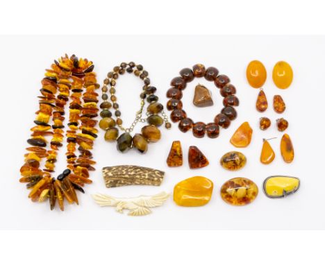 A collection of amber type jewellery to include a Polish silver mounted egg yolk brooch, length approx 40mm, Polish silver ma