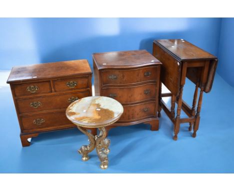 Two sets of reproduction mahogany Georgian chests of drawers, oak dropleaf table and a mid 20th Century onyx and brass wine t
