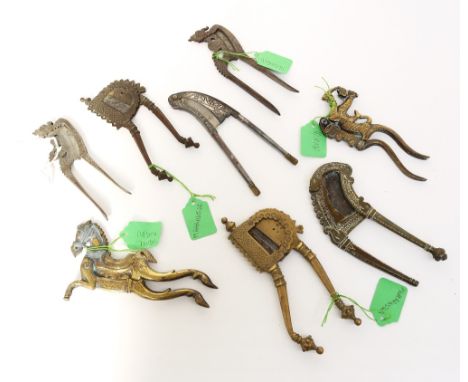 Eight pairs of 19th/20th century betel cutters comprising of a Maharashtrian pair with incised decoration, 15cm long; a 20th 