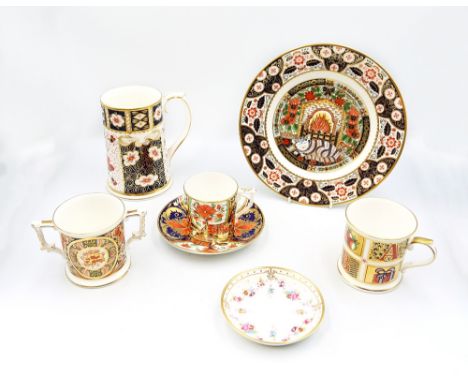 A group of Royal Crown Derby items to include an Imari, 2 handled Loving cup , a Royal Crown Derby ABC mug, a Royal Crown Der