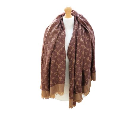 A Louis Vuitton brushed cashmere shawl with tassel fringe.