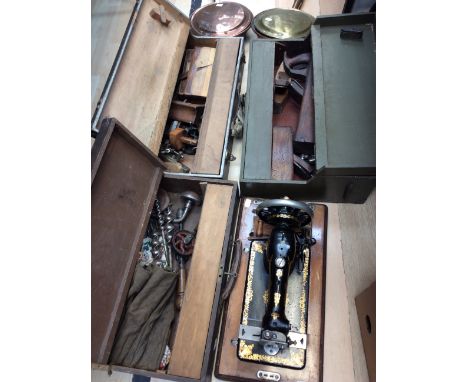 A collection of three tool chest / boxes with contents to include; planes, saw, a carpenters scribe, measures and others, tog