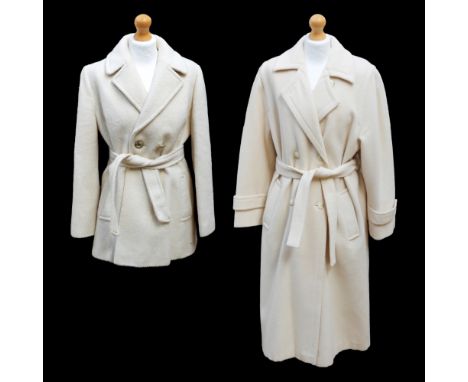 A Miss Marshall cream wool coat, double breasted, classic design, lapel collar, loose belt, fully lined and decorative button