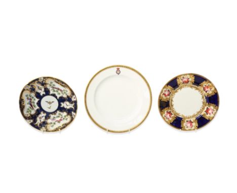 A 19th century porcelain dinnerplate, bearing Victoria and Alberts monogram; within a gilt and black Greek Key border, bearin