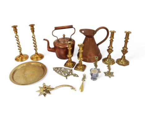 A collection of brass and copper wares, 19th and 20th Century including candlesticks, bed pans and kettles etc along with an 