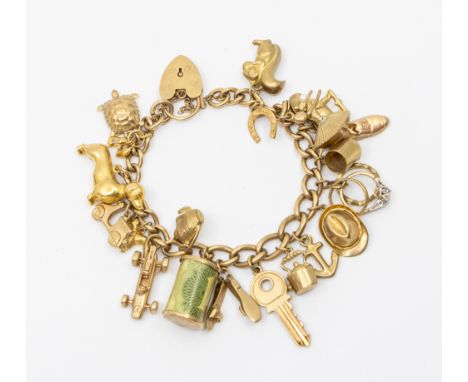 A 9ct gold charm bracelet comrising oval curb links stamped 9 375, width approx 5mm, padlock clasp, length approx 18.5cm, sus