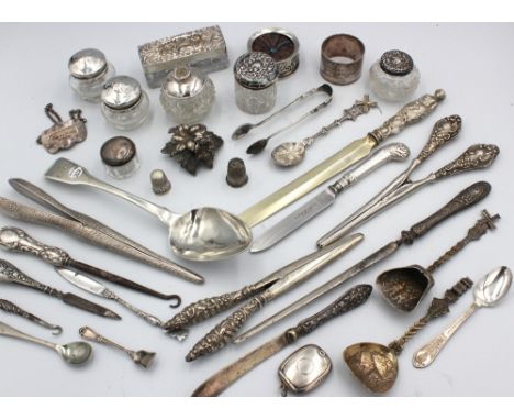 A collection of silver to include; various cut glass silver topped or collared vanity / toilet pots comprising of a rectangul