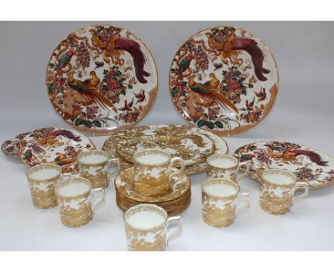 A selection of eight Royal Crown Derby "Aves Gold" patterned coffee cans and saucers, all second quality; a "Gold Aves" patte
