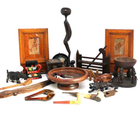 A collection of early to mid 20th Century treen items to include ornate pipe rack with vintage pipes, hanging treen frames, A
