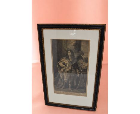 A 17th Century oak framed etching and inscription of Charles I in three different profiles.