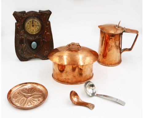 A group of Arts &amp; Crafts period copper items to include; a hammered copper oval shaped tea cannister and cover, with twis