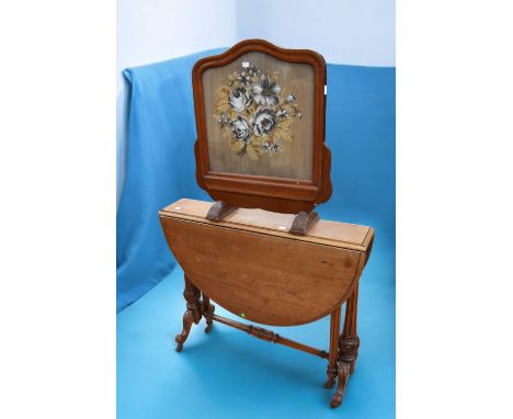 A Victorian mahogany dropleaf occasional table along with a Victorian mahogany fire screen with beadwork detail.