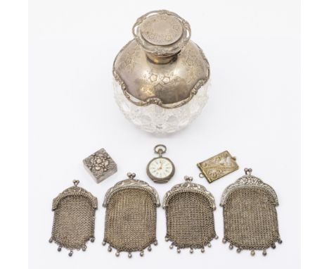 A small selection of silver to include: a Birmingham silver topped and mounted cut glass scent bottle, of globular form, the 