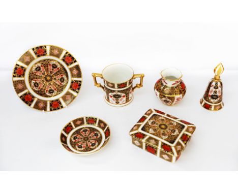 A collection of Royal Crown Derby 1128 imari items to include pin dishes, candle snuff, vase, trinket dish, 6 1/2" tea plate 