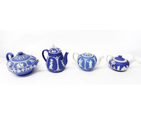 Four Wedgwood blue jasperware 19th century ceramic tea pots, all with classical designs. (4) One with 'widow' finial. Conditi