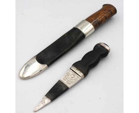 A David Andersen of Norway hand knife and sheaf, the leather sheaf with sterling silver banding, steel blade with burr wooden