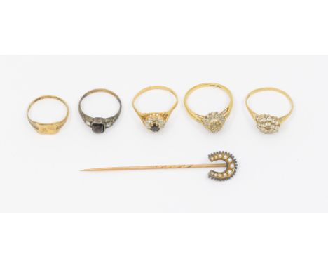 A collection of four 9ct gold mounted rings, comprising a diamond cluster, size R, a sapphire and white stone cluster, size O