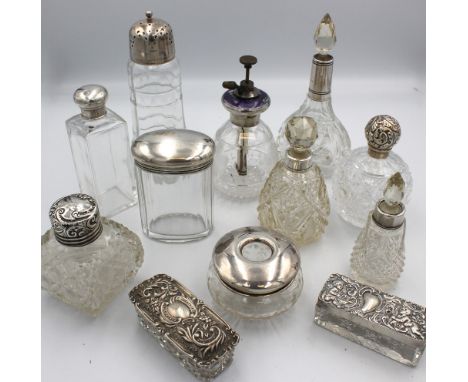 A collection of mixed Victorian and later silver collared or topped cut glass items comprising: a globular cut glass perfume 