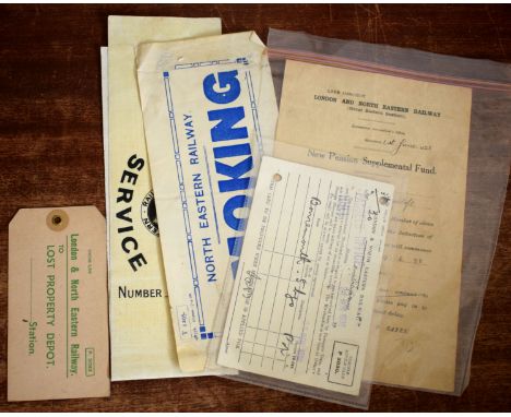 Folded linen strip 46 x 7cm printed ‘North Eastern Railway RAILWAY SERVICE Number 13729’ together with NER paper notice ‘SMOK