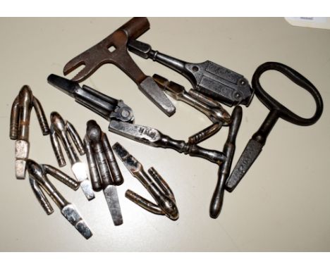 Eleven rai9lcarriage keys: 1 x Midland, 1 x LNER, 1 x GWR and 1 with detailed engraved patterning and push button to release 
