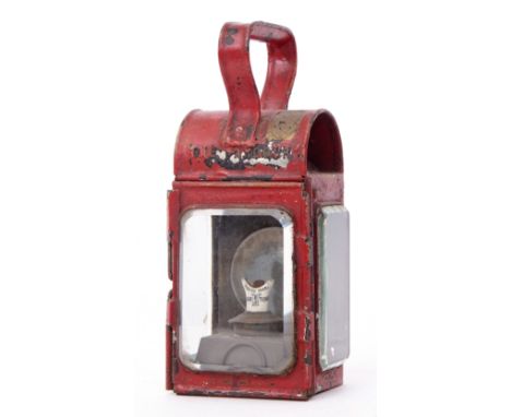 Small red Hand Lamp. No railway markings but small brass maker’s plate on top. Fittings complete, ceramic labelled ‘Bar BB to
