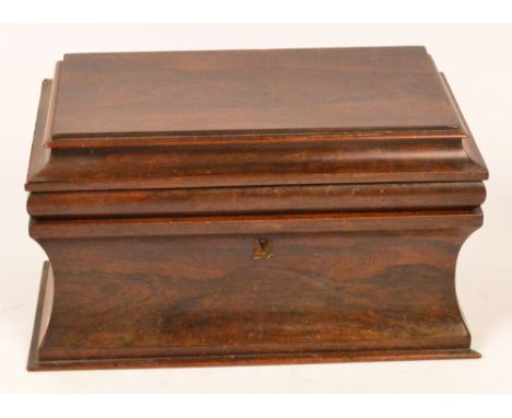 A Victorian rosewood tea caddy, the hinged lid enclosing three lidded compartments and with waisted sides, width 33cm (for re