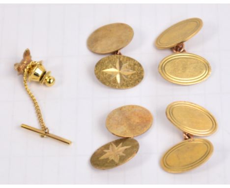 Two pairs of 9ct gold cufflinks and a fox head tie pin, combined approx 21.7g.