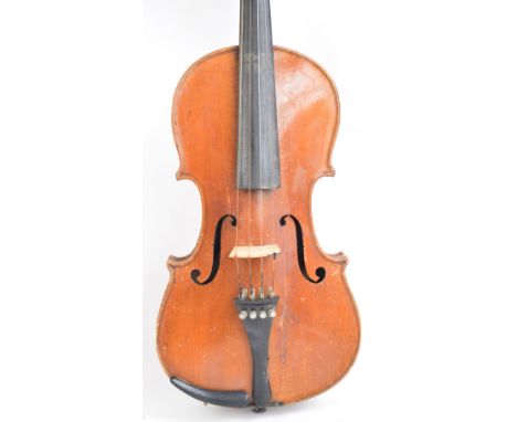 A full size violin with two-piece back, Stradivarius copy, length of back 36cm, cased with a bow. CONDITION REPORT: Major sou