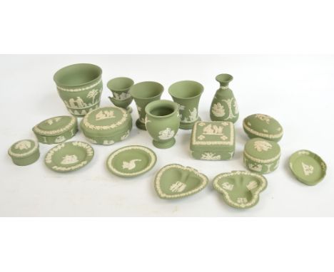 Seventeen pieces of Wedgwood green jasperware including vases, trinket boxes etc.