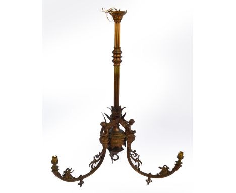 A gilt metal light fitting, the fluted turned central column to three winged figural mounts, each above a scrolling fluted br
