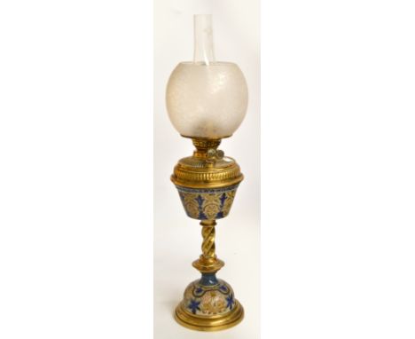 A late 19th century Doulton stoneware and brass mounted oil lamp, with leaf decorated reservoir, central rope twist column an