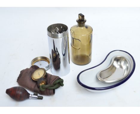 A stainless steel cylindrical surgeon's instrument set by Holborn Scientific Instruments Co, two kidney shaped dishes, a glas