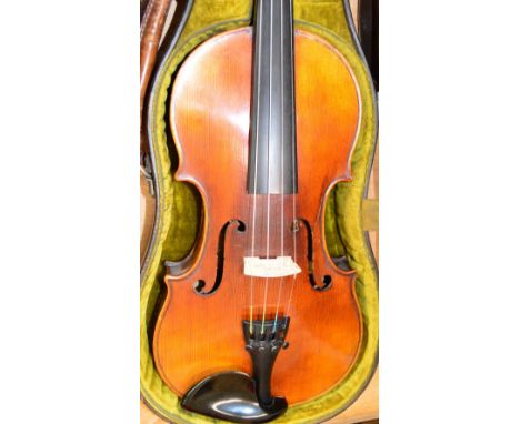 A full size German violin with two-piece back, Stradivarius copy, length of back 35.3cm, in a Hart & Son case with bow.