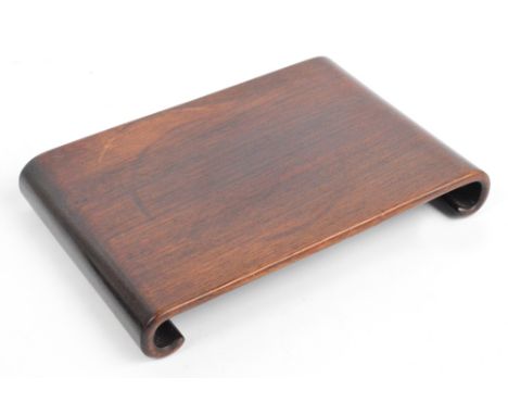 A 19th century Chinese Huali wood one-piece stand with scroll feet, 24 x 17cm. CONDITION REPORT: Rim marks on the top, minor 