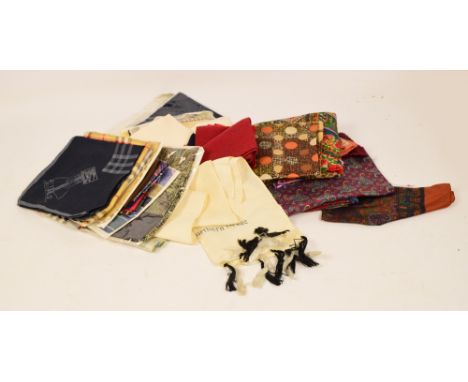 A quantity of silk and art silk scarves and handkerchiefs including examples for Burberry and Liberty, an Oliver Messel Silve
