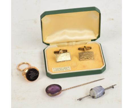 A small quantity of jewellery comprising a yellow metal tie pin with classical man's head intaglio on a purple stone, a bar b