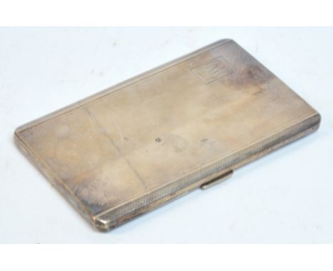 A George VI hallmarked silver cigarette case of rounded rectangular form with engine turned decoration and engraved with the 