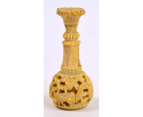 A 19th century Chinese Canton carved ivory seal, decorated to one end with a dragon, length 6cm.