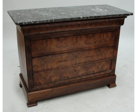 A 19th Continental walnut and burr walnut marble topped four drawer commode raised on bracket feet, width 124cm.