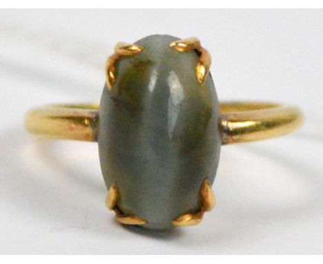 An 18ct yellow gold and cabochon set ring, size K/L.